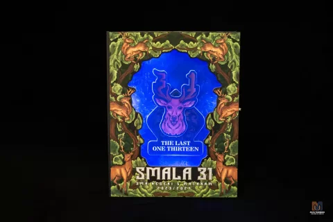 Kover buku tahunan SMAN 5 Mataram angkatan 31 bertema The Last One Thirteen dengan ilustrasi rusa biru bercahaya di tengah hutan.